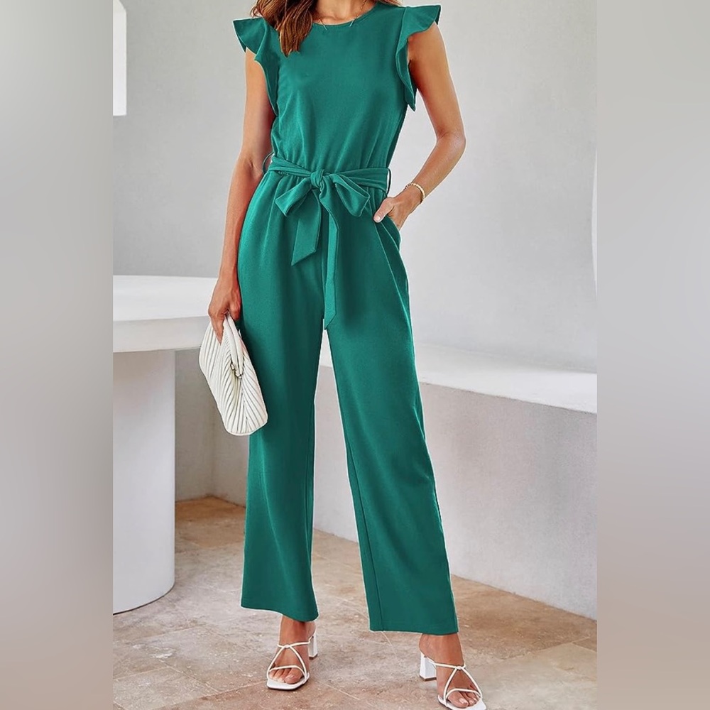 Brand new with tags emerald green jumpsuit with pockets. Size large.